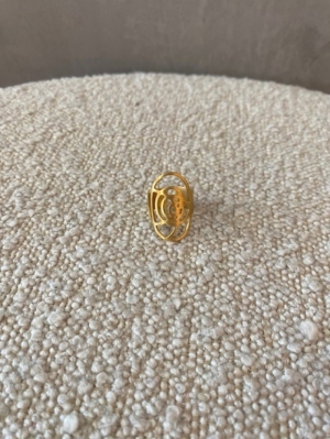 gouden ovalen ring met bloem goud