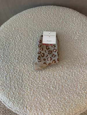 glitter kous amour leopard bruin